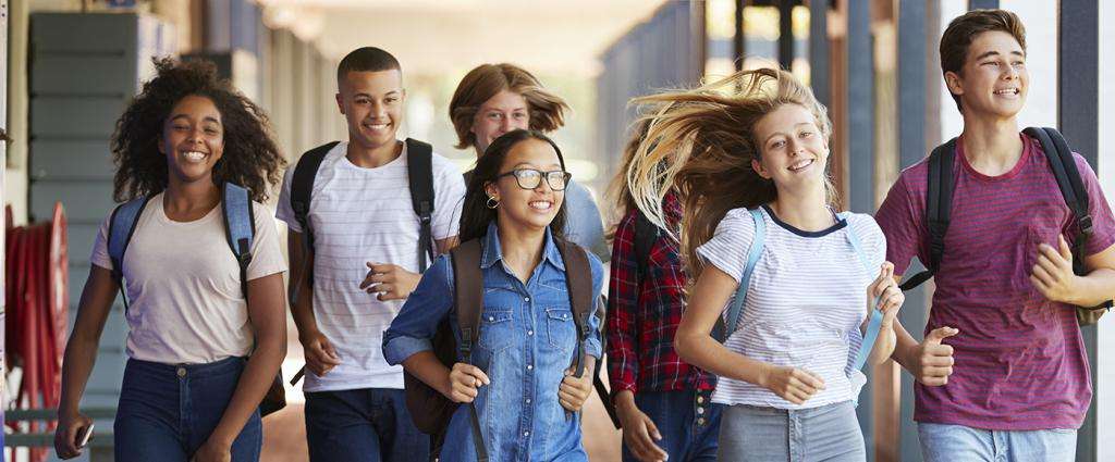CDW Joyful students walking in corridor