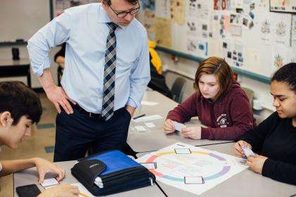 Elections Canada's CEO in a classroom with students.