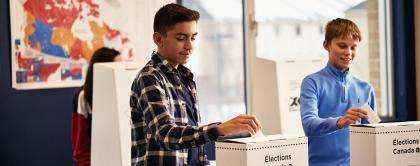 Students voting in mock election.