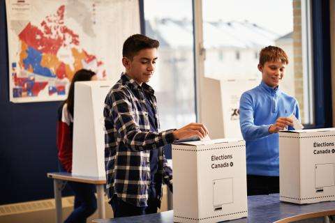 students voting in mock election students voting in mock election