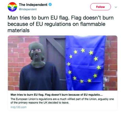 Tweet from The Independent (@independent). Tweet: Man tries to burn EU flag. Flag doesn't burn because of EU regulations on flammable materials.