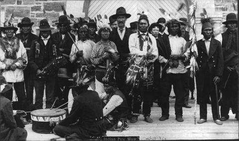 Black and white picture of an Aboriginal Pow Wow in Rat Portage, Ontario