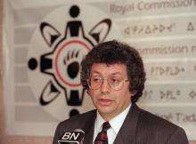 VRTT_FNP_1996_EN Co-Chair of the Royal Commission on Aboriginal Peoples Georges Erasmus speaks in front of a microphone.