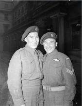 VRTT_FNP_1948_EN Black and white photo of Sergeant Tommy Prince (on the right), 1st Canadian Parachute Battalion, with his brother, Private Morris Prince, at an investiture at Buckingham Palace.
