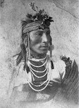 VRTT_FNP_1869_EN Black and white portrait of a First Nations man from the Plains.